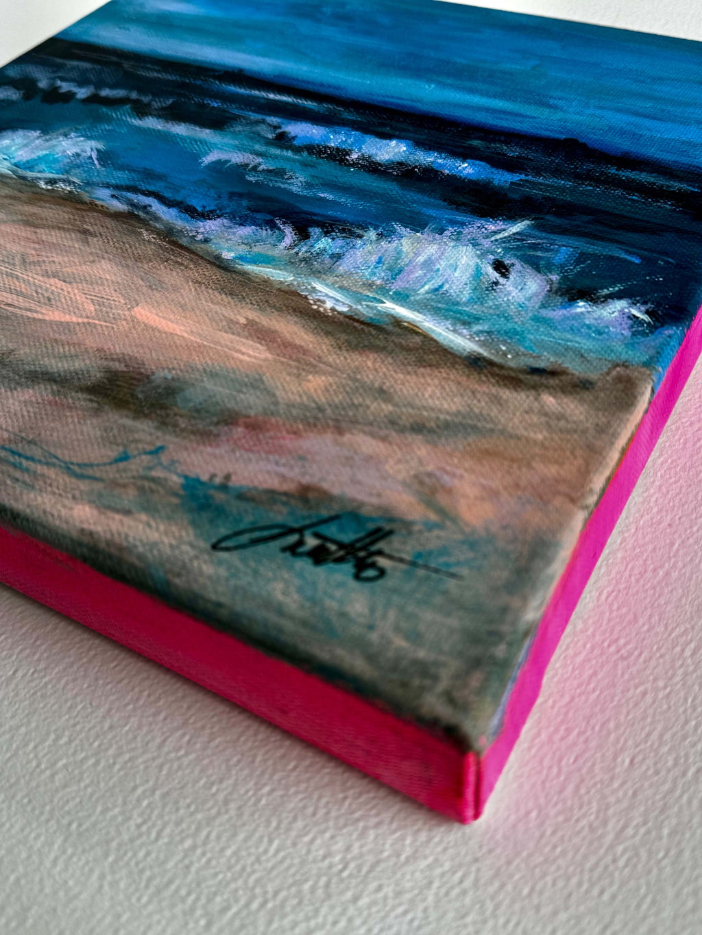 Angled view of Between Waves showing the gallery-wrapped canvas edge
