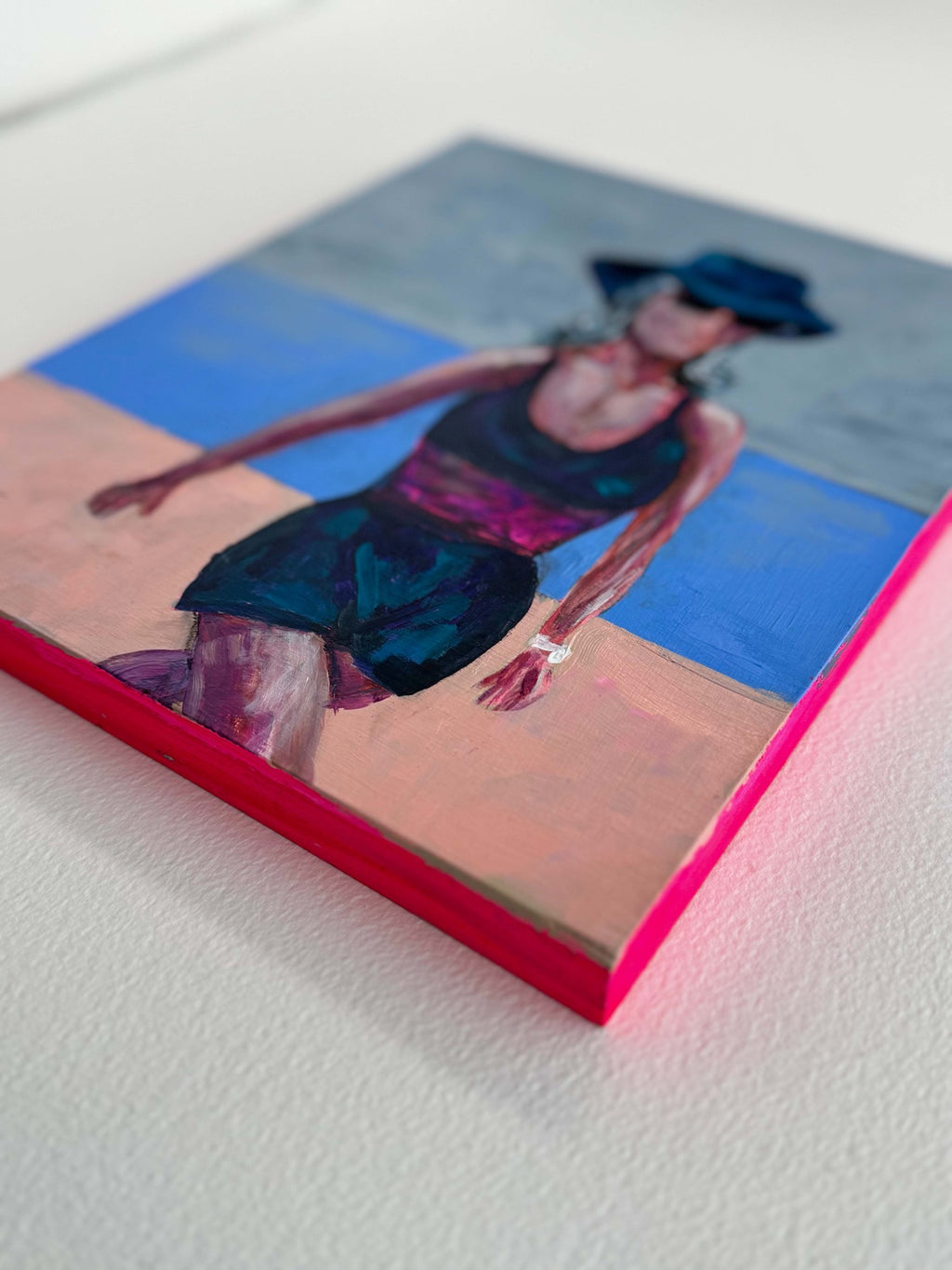 Angled view of She Came Prepared showing the painted wood canvas edge