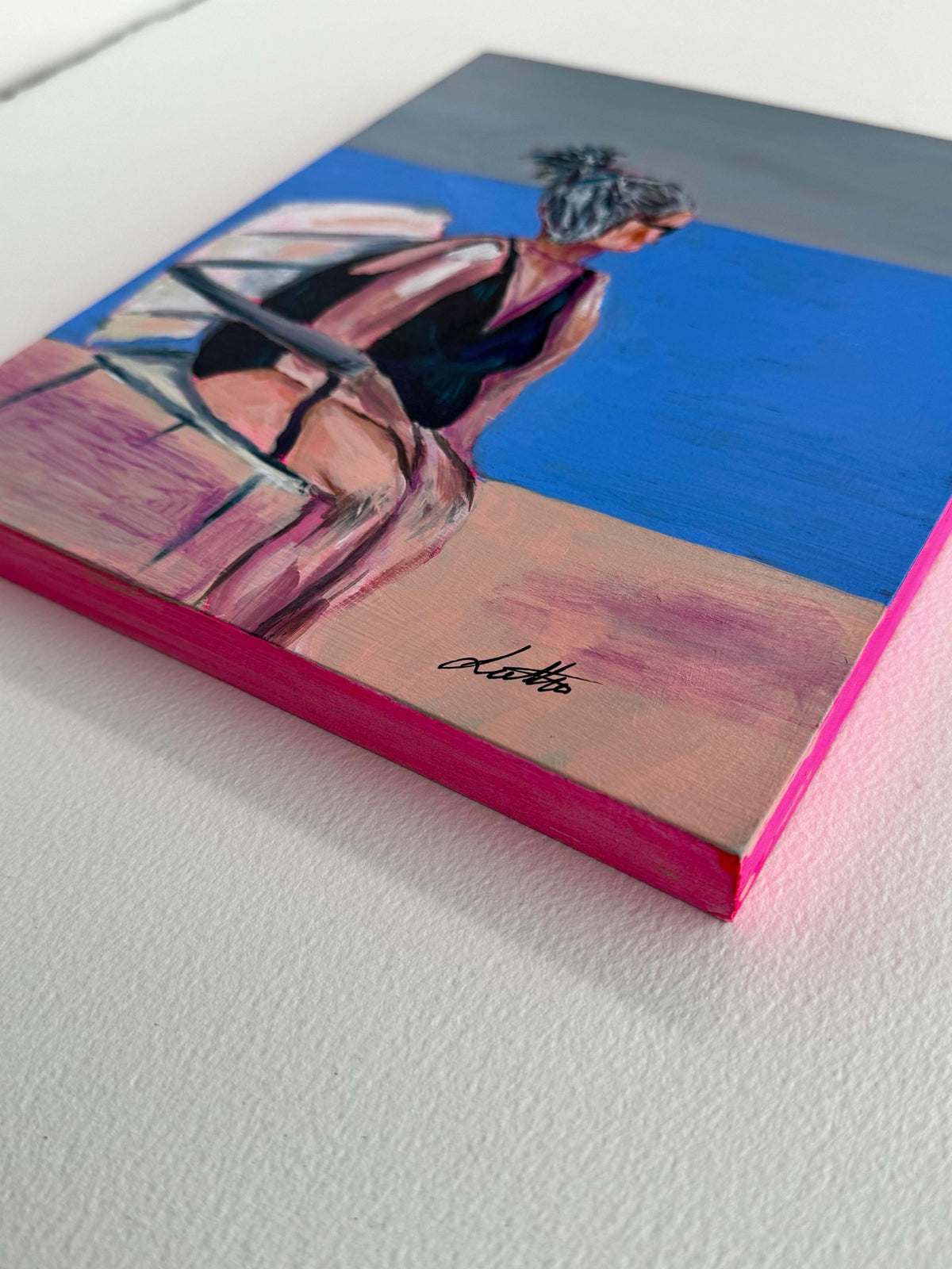 Angled view of She Wasn't Going Anywhere showing the painted wood canvas edge