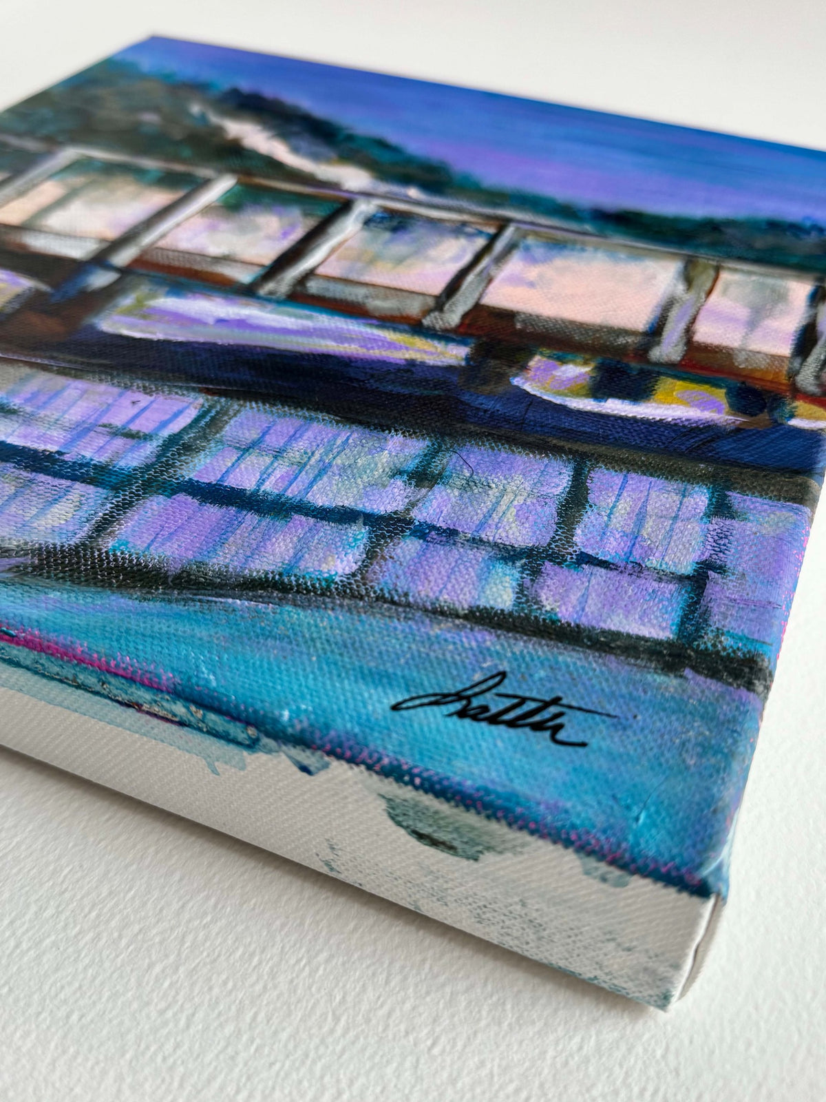 Angled view of Under the Pier showing the gallery-wrapped canvas edge